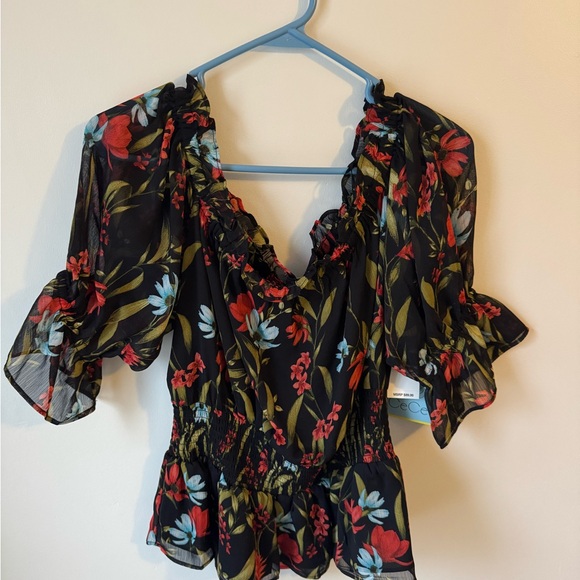 CeCe Tops - CeCe Black, Red and Blue. Flirty Blouse with Flutter Sleeves and Ruffled Style.